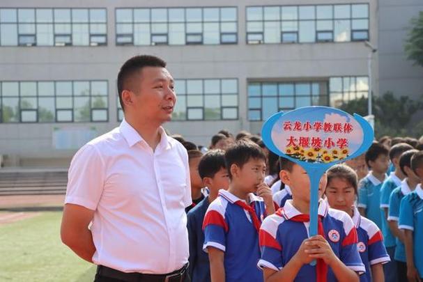 坡巷小学体育老师名单电话,坡圩小学